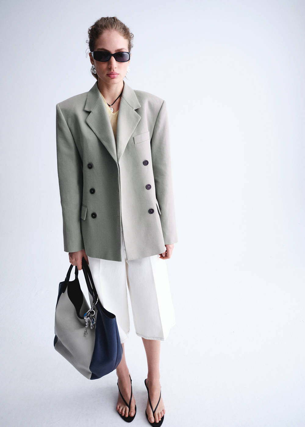 Double-breasted blazer with button closure - Image 3