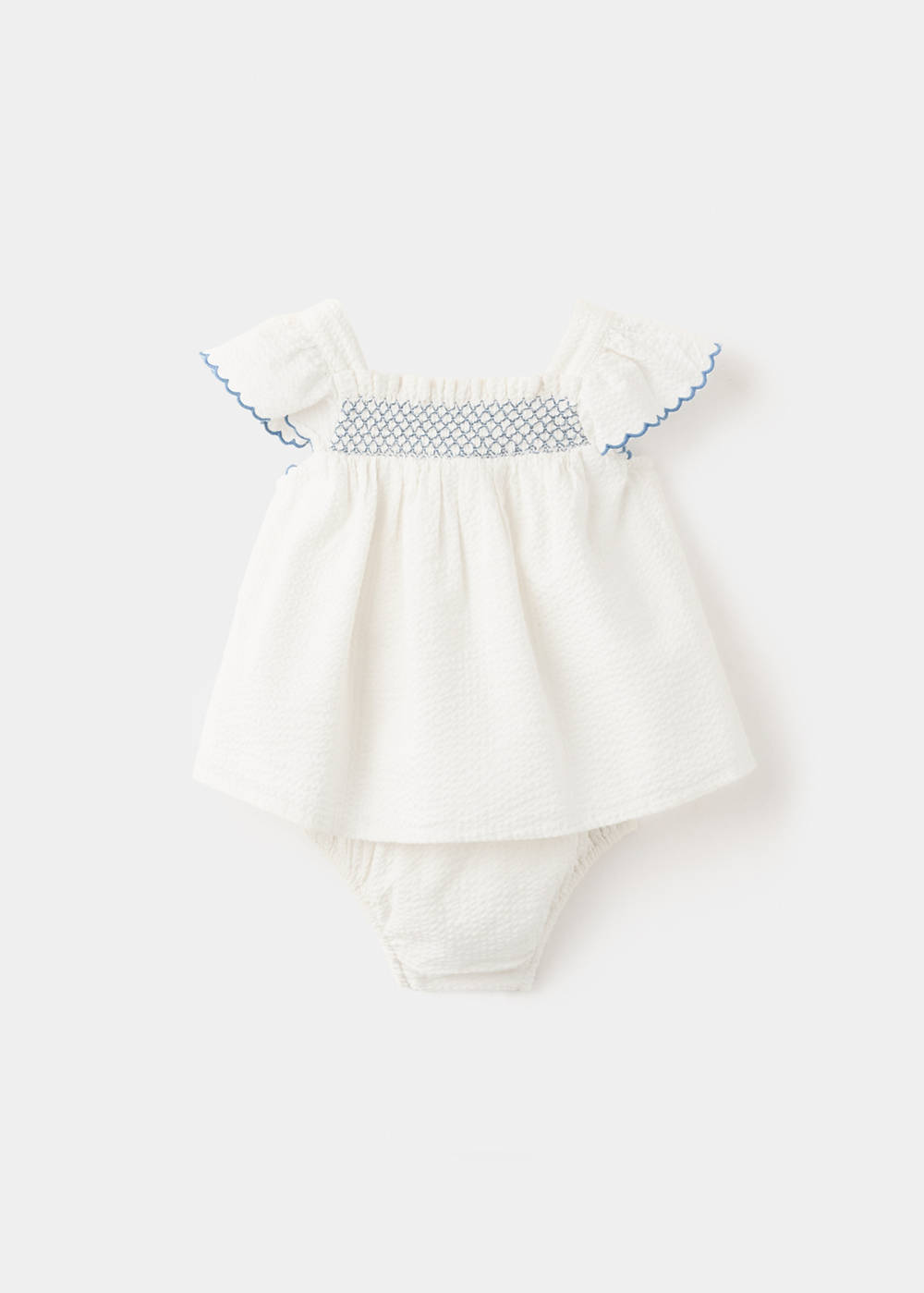 Dress and frog with embroidered details