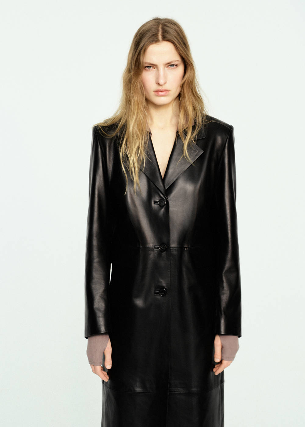 Straight leather coat with pockets