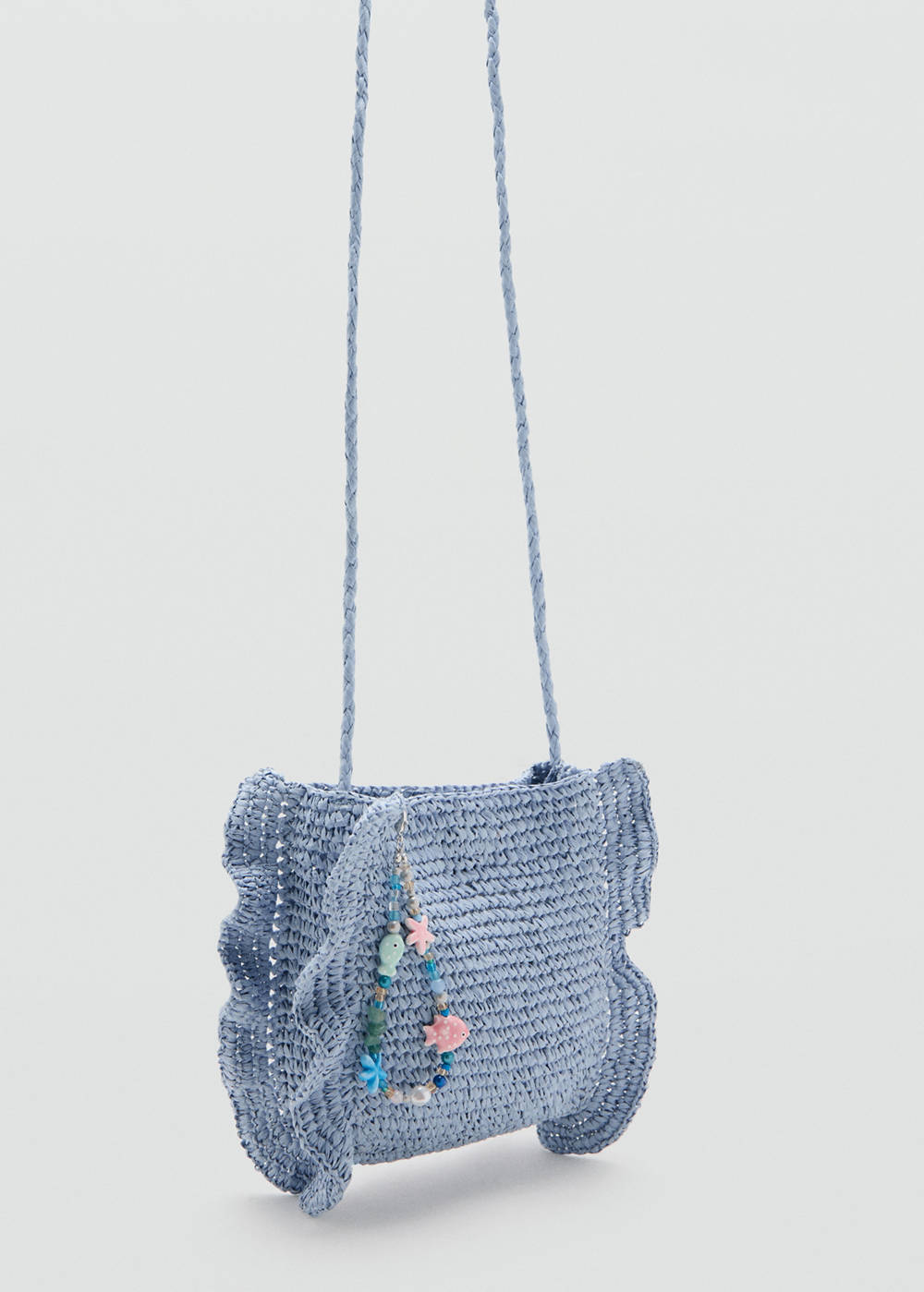 Natural-fiber bag with charm