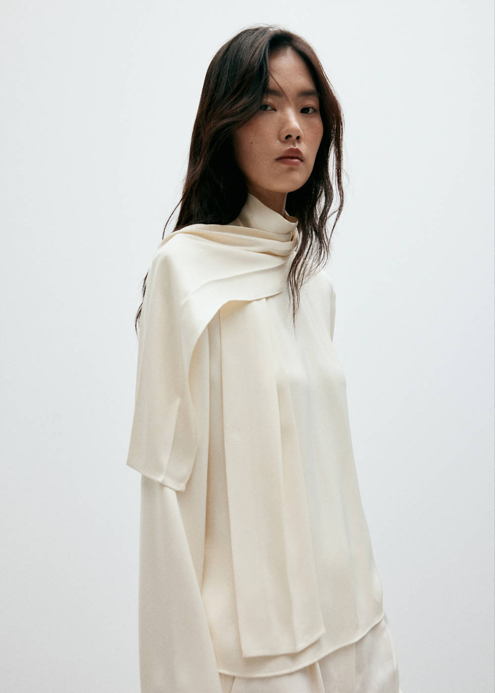 High-neck blouse with scarf detail
