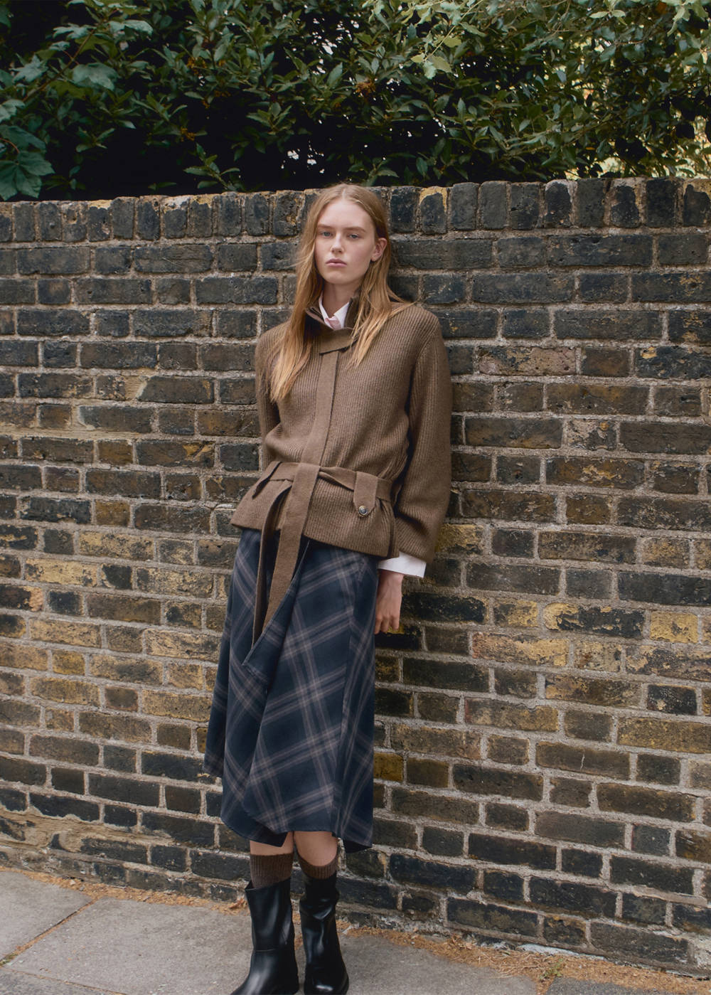 Knitted jacket with belt