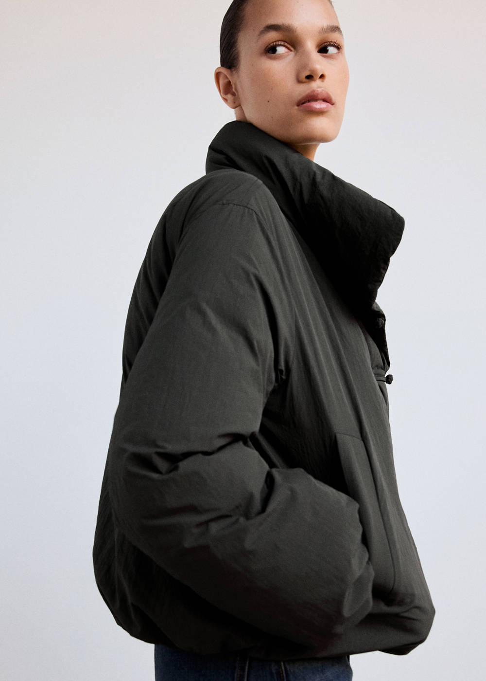 Padded anorak with toggle fastenings