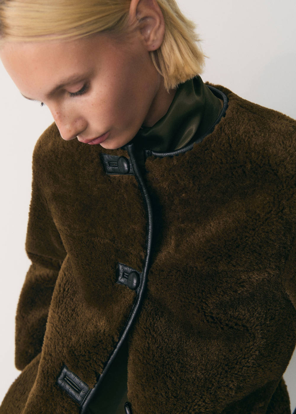 Faux-fur coat with appliqués
